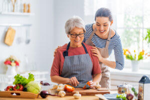 Two women making a healthy dinner.